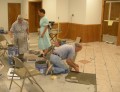 2005-06-10 Lloyd is installing the tile in the cafeteria * 2142 x 1653 * (697KB)